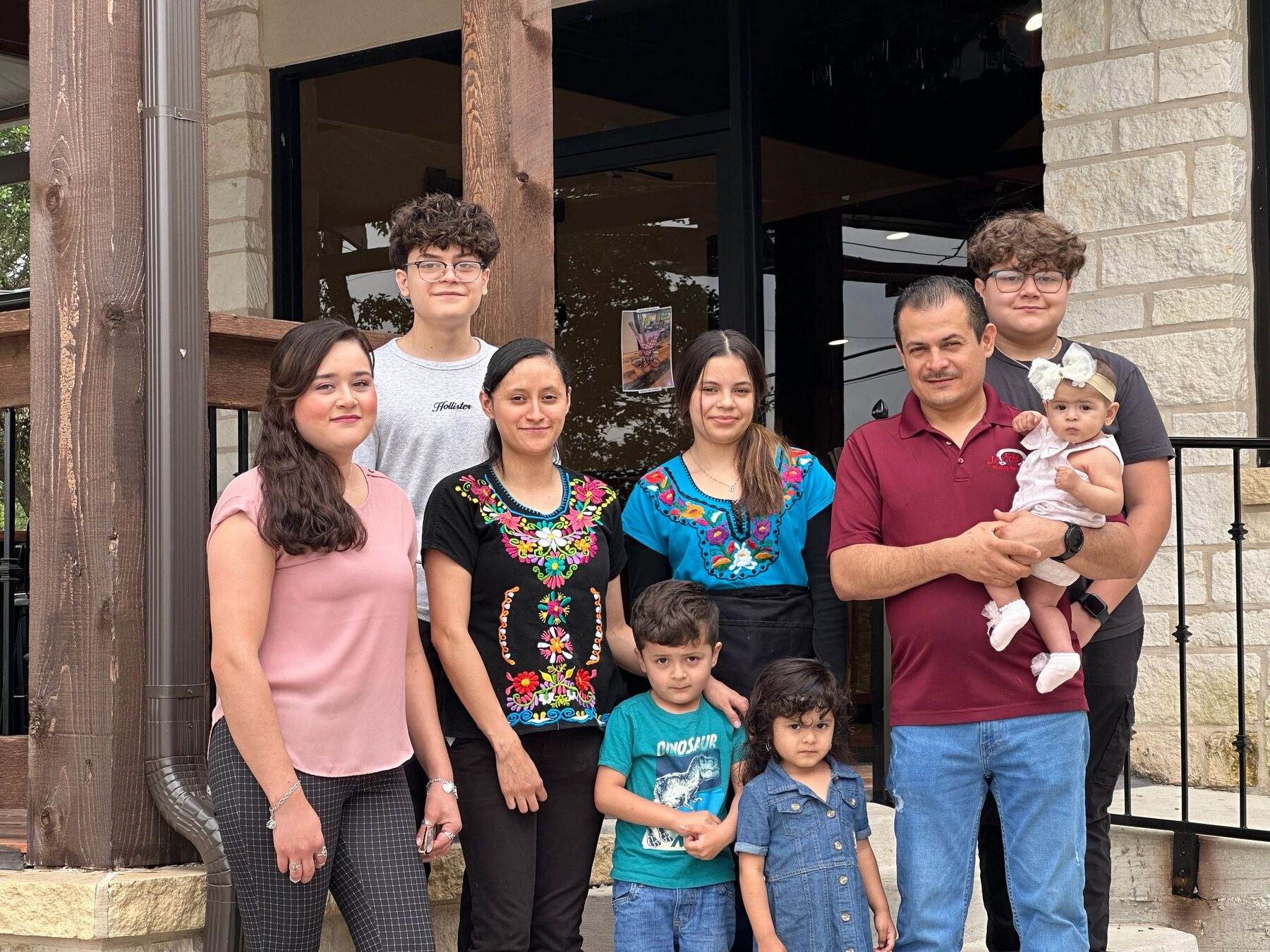 The Alvarez family gathered at the entrance of El Jalisco #3